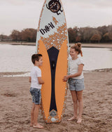 moai kids board 8'0 op het strand